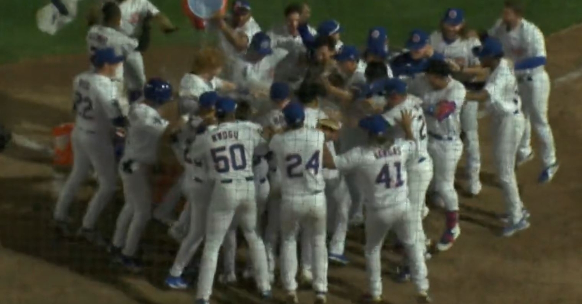 The I-Cubs celebrate after the walk-off homer