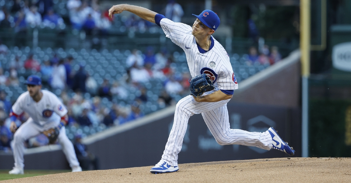 Thompson remains unbeaten as Cubs top rival Cards
