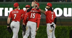 Cubs sink to last place after loss to Reds